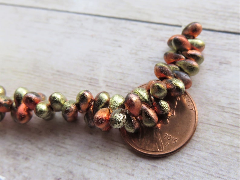 Item 6999 California Gold Etched Czech Teardrop 4 by 6 mm Beads 50 Beads