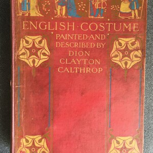 May include: A red book cover with the title "English Costume" painted and described by Dion Clayton Calthrop. The cover features gold and yellow floral designs and illustrations of people in historical clothing.