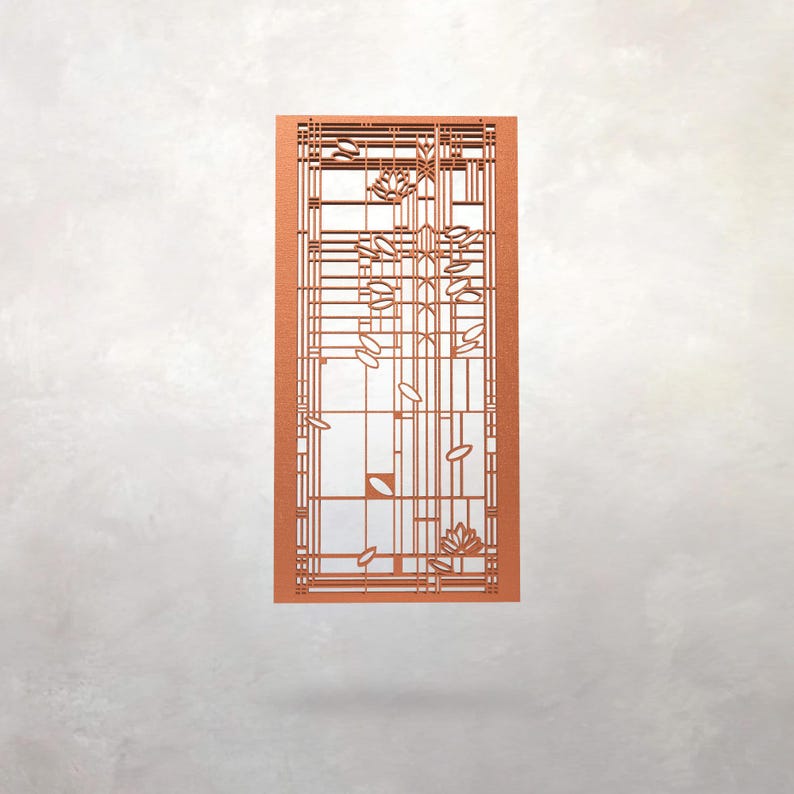 May include: A copper-coloured, rectangular decorative panel with a geometric design. The panel features a grid-like pattern with floral and leaf motifs. The design is cut out, creating negative space within the panel's frame. Likely made of metal or wood.