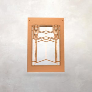 May include: A rectangular, copper-coloured wall art piece with a geometric design. The artwork features a layered, openwork pattern of lines, angles, and shapes, creating a three-dimensional effect. The design is reminiscent of architectural elements.
