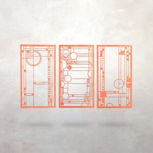 May include: Three orange geometric art panels with a mid-century modern design. Each panel features a unique arrangement of lines, circles, and rectangular shapes. The panels are displayed against a light gray background.
