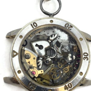 Watch parts necklace on recycled chain