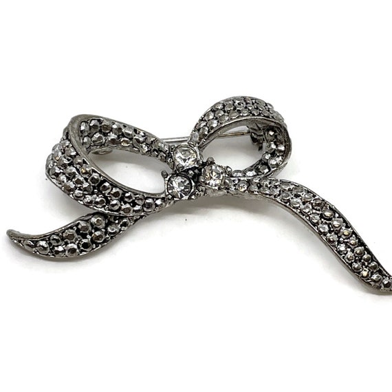 Silver-tone bow brooch with rhinestones - image 1