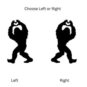 May include: Black silhouette images of Bigfoot figures, one on the left and one on the right, each forming a heart shape with their hands. The text "Choose Left or Right" is above the figures, with "Left" and "Right" below.