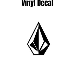 May include: A black and white vinyl decal with the text "VINYL DECAL" above a geometric logo. The logo is a stylized diamond shape with black and white triangular segments.