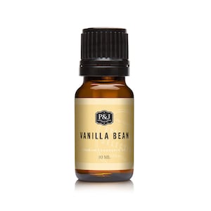 May include: A brown glass bottle with a black cap, labeled "Vanilla Bean" and "Premium Fragrance Oil". The bottle contains 10 ml of oil.