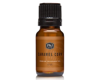 May include: A brown glass bottle with a black cap containing Caramel Corn scented oil. The label is brown with white text that reads "P&J Trading Co. Caramel Corn Selection Premium Fragrance Oil 10 ml."