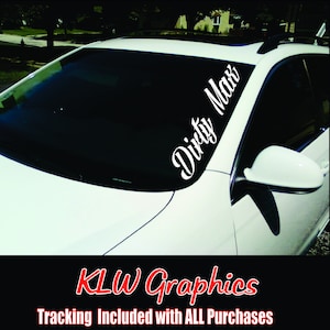 May include: White vinyl decal sticker with the text "Dirty Max" in a cursive font. The sticker is applied to the windshield of a white car.