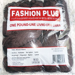 May include: A package of brown yarn labeled "FASHION PLUS." The label indicates the yarn is a mixed fiber, machine washable, and weighs 16 oz (454 grams). The packaging includes text in English, French, and Spanish.