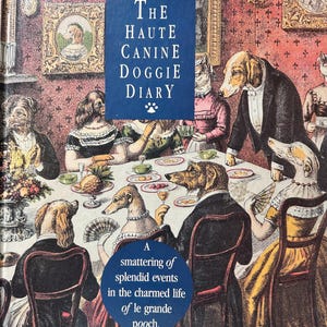 May include: An illustrated book cover titled "The Haute Canine Doggie Diary." The image depicts a dining scene with dogs dressed in human attire. The text "A smattering of splendid events in the charmed life of le grande pooch" is also visible.