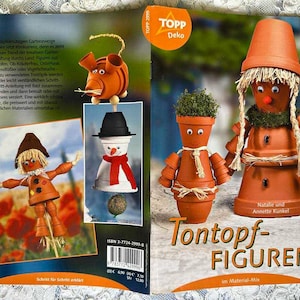 May include: A book cover with the title "Tontopf-Figuren" in a brown, white, and green color scheme. The cover features illustrations of various clay pot figures, including a snowman, a scarecrow, and a flower pot with a face. The book is about creating clay pot figures.