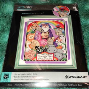May include: A counted cross-stitch pattern featuring a colorful illustration of Noah's Ark with animals and the text "And God Remembered Noah and Every Living Thing". The pattern is by Artiste Counted Cross Stitch and is part of the Zweigart brand.