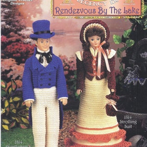 May include: Crochet patterns for a Regency era gentleman and lady doll. The gentleman is wearing a blue jacket, white pants, and a top hat. The lady is wearing a burgundy dress with a white lace collar and a matching bonnet. The pattern is titled "Rendezvous By The Lake".
