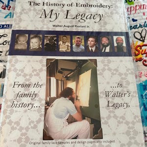 May include: A book titled The History of Embroidery: My Legacy by Walter August Floriani Jr. The cover features a series of eight portraits of the author at different ages and a central photograph of a person working on a large embroidery design.
