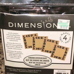 May include: Cross stitch kit for making four Aztec-inspired coasters. The kit includes pre-punched wood coasters, embroidery floss, a needle, and instructions. The kit is packaged in a clear plastic bag with a colorful label.