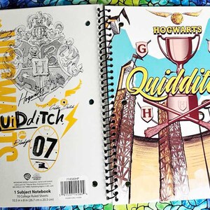 May include: A Hogwarts Quidditch themed notebook with a yellow and white cover featuring the Hogwarts crest and the text "Hogwarts Quidditch 07". The back cover features a colorful illustration of a Quidditch match with the text "Hogwarts Quidditch".
