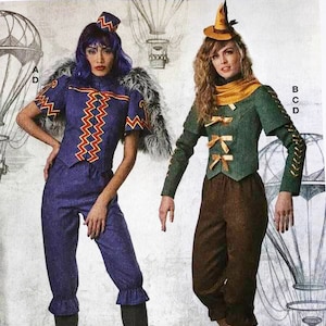 May include: Two women's costumes for a play or party. One costume is a blue and red military-style jacket with a fur collar and matching blue pants. The other costume is a green jacket with brown pants and a brown hat with a pointed top.