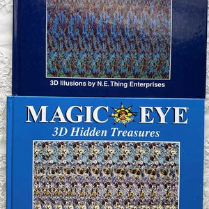 May include: Two Magic Eye books with blue covers. The top book has a colorful 3D illusion of a field of flowers. The bottom book has a 3D illusion of a field of dogs. Both books have the Magic Eye logo and the text "3D Illusions" on the cover.