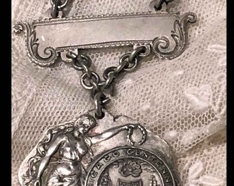 VINTAGE STERLING BOYS Race Pin Centennial Chicago 1903 Dangle Pin Exquisite Woman with Flowing Hair Shell Under the Auspices Not Monogrammed