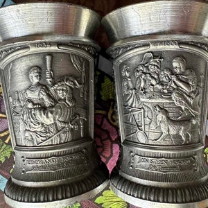 TWO Old PEWTER REMNANDT Jan Steen Sorgh Shot Glasses W.M. Zinn Ges Gesch Germany Previously Owned