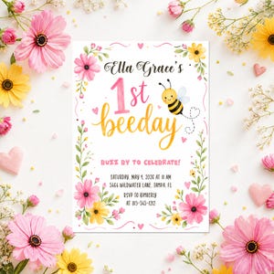 May include: A birthday invitation with the text "Ella Grace's 1st beeday" and a cartoon bee. The invitation is decorated with pink and yellow flowers, with the words "Buzz by to celebrate!" below the main text.