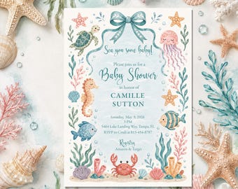 May include: Watercolor baby shower invitation with a sea life theme. The invitation features a blue bow, sea creatures, and the text "Sea you soon baby!" and "Baby Shower". The invitation includes the date, time, and location.