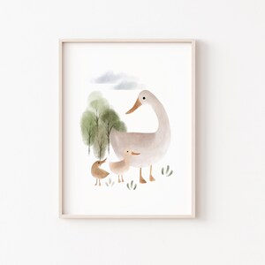 May include: A watercolor illustration of a mother duck and two ducklings. The ducks are light brown and gray, and they are standing in a field with green trees and a blue sky.