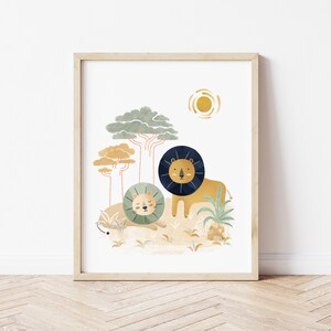 May include: A digital illustration of two lions in a jungle setting. The lions are depicted in a cartoon style with a yellow and orange background. The larger lion is standing and the smaller lion is lying down. The illustration is framed in a light wood frame.
