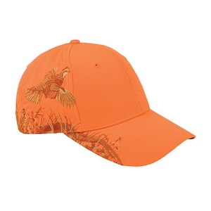May include: An orange baseball cap with an embroidered design of a quail in flight. The cap has a curved brim and a brown and gold embroidered design on the front and side.