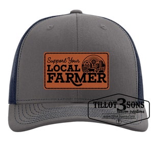 Support Your Local Farmer logo on a Richardson Trucker Hat w/ Laser Engraved Patch applied to the front image 1