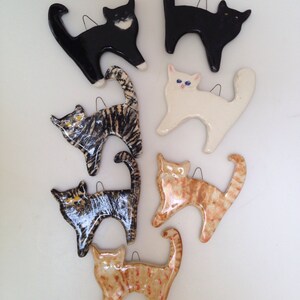 Cat Ornaments that almost purr! Black and white galore