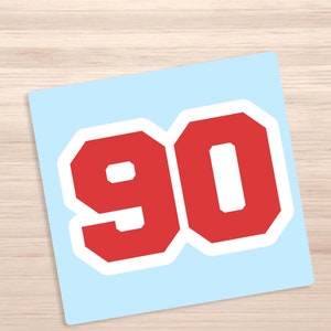 May include: Red number 90 with a white outline on a light blue background.