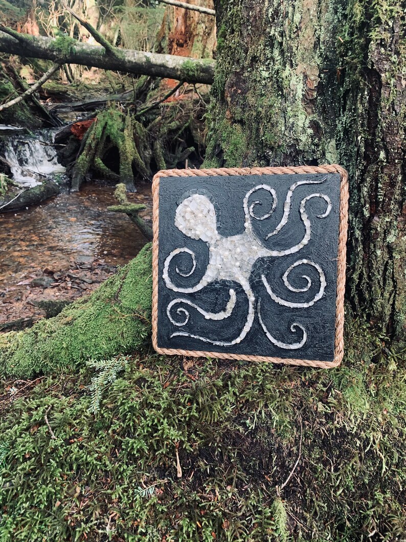 small double point quartz 13x13\u201d octopus ungrounds mosaic of fresh water pearls and tiny Icelandic spar.