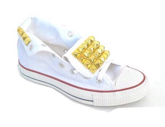 white converse with gold tongue