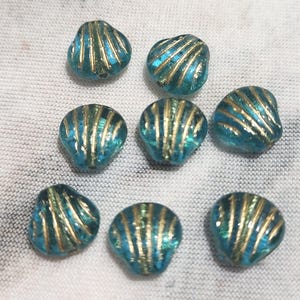 Eight 9mm shell shape Czech glass beads
