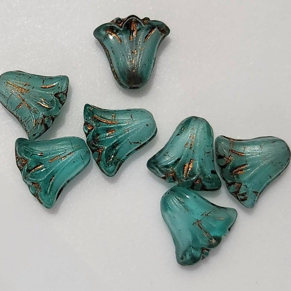 Twelve Lily 9x10mm Aqua transparent with white core with dark bronze wash Czech glass beads