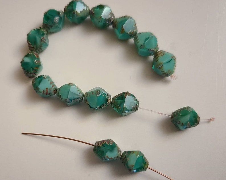 Ten Faceted 8x10mm Bicone Sea green Czech glass beads
