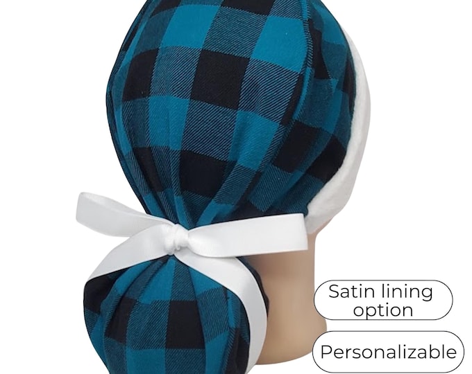 Christmas ponytail scrub cap in teal and black buffalo plaid flannel with fluffy white band Santa-inspired look, satin lined option