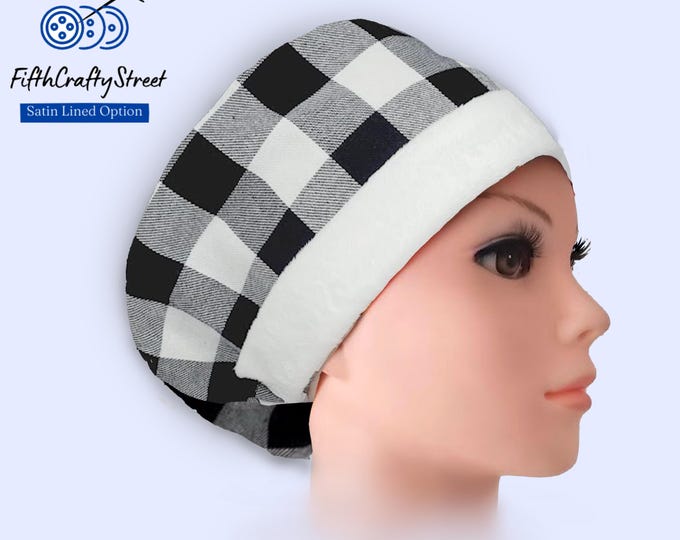 Christmas Euro Scrub Cap in a white and black buffalo plaid flannel with fluffy white band Santa-inspired look, Satin lined option