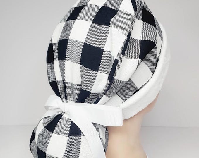 Christmas ponytail scrub cap in white and black buffalo plaid flannel with fluffy white band Santa-inspired look, satin lined option