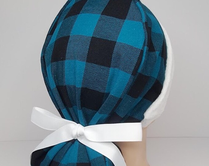 Christmas ponytail scrub cap in teal and black buffalo plaid flannel with fluffy white band Santa-inspired look, satin lined option
