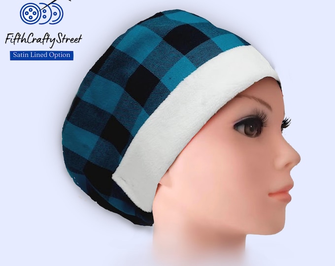 Christmas Euro Scrub Cap in a teal and black buffalo plaid flannel with fluffy white band Santa-inspired look, Satin lined option