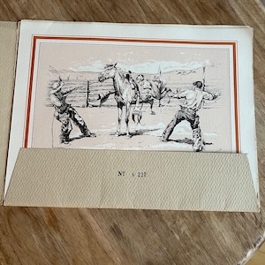 May include: A black and white illustration of two cowboys working with a horse in a corral. The cowboys are wearing hats and boots. The horse is standing in the center of the image. The image is titled "No. N 227".