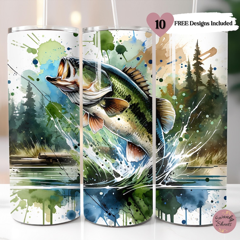 Puede incluir: Un dise&ntilde;o de acuarela de una lubina saltando fuera del agua con una salpicadura. El dise&ntilde;o est&aacute; en un vaso blanco con un fondo verde, azul y blanco. El vaso es de 20 onzas y tiene una pajita.