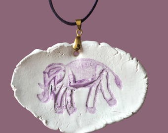 Double sided purple elephant statement necklace on faux suede cord