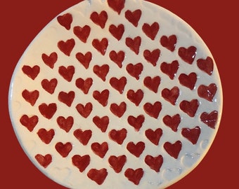 Heart patterned and slightly textured ceramic food safe plates
