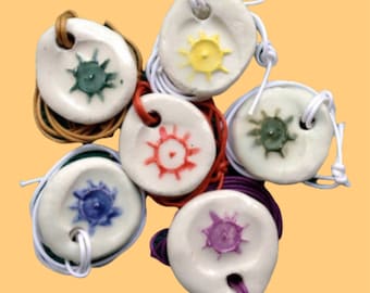 Sun Symbol Necklace: Ceramic Pendant on Cotton Cord