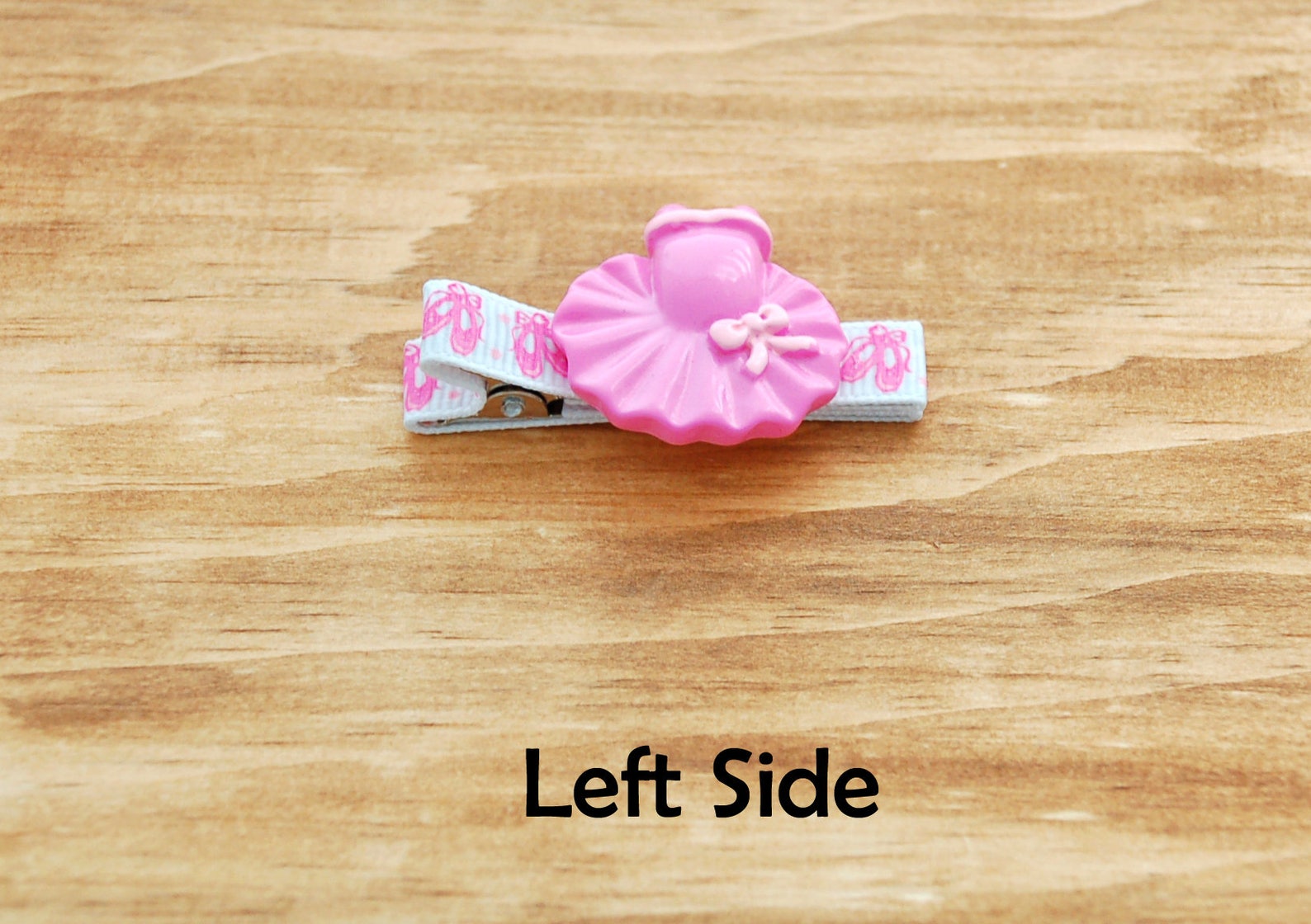girls barrette fully lined on a double prong alligator clip in white grosgrain with pink ballet slipper and pink tutu embellishm