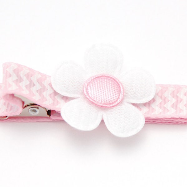 Toddler barrette fully lined on a double prong alligator hair clip in light pink grosgrain with white chevron stripes and a white flower