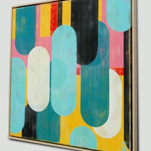 May include: Abstract painting with a geometric design featuring rounded shapes in shades of blue, yellow, pink, white, and black.